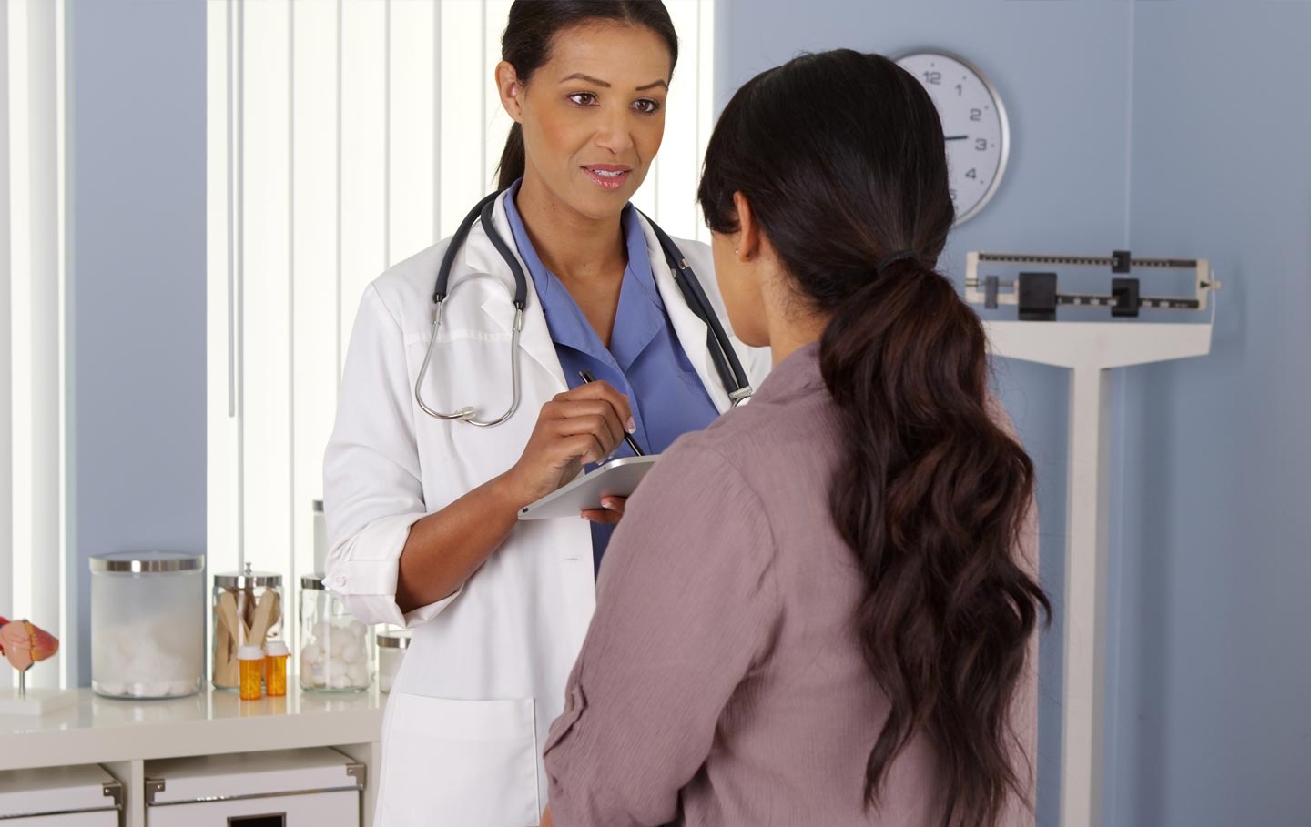 Doctor asking patient questions
